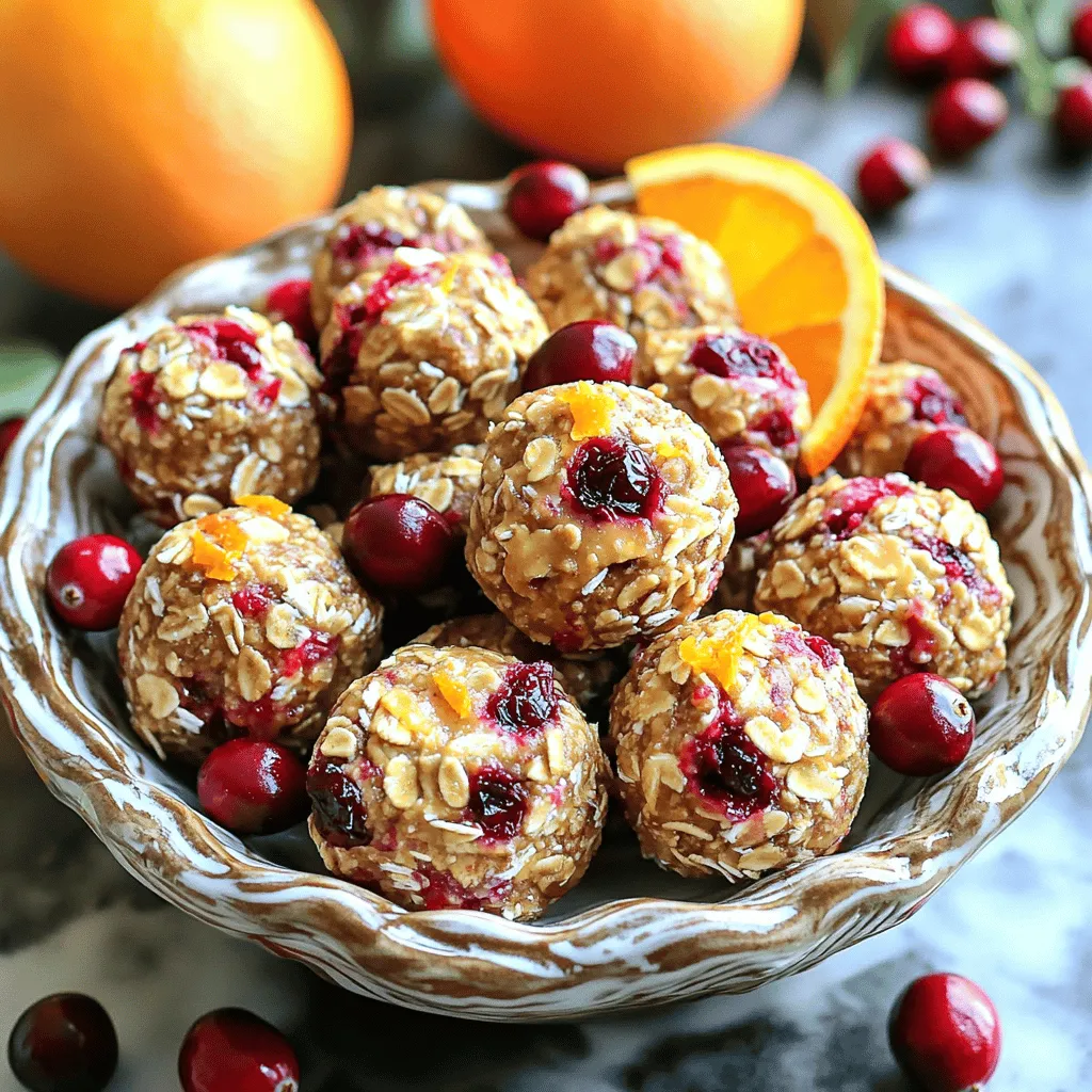 - 1 cup rolled oats - 1/2 cup chopped dried cranberries - 1/2 cup almond butter - 1/4 cup honey or maple syrup - Zest of 1 orange - 1 tablespoon fresh orange juice - 1/4 teaspoon cinnamon - 1/4 cup mini dark chocolate chips (optional) - Pinch of salt These ingredients blend together to create a tasty and healthy snack. The rolled oats give a great base, while the dried cranberries add a sweet and tangy flavor. Almond butter brings in healthy fats and protein. Honey or maple syrup acts as a natural sweetener. The zest and juice from the orange give a bright, fresh taste. Cinnamon adds warmth, and the optional chocolate chips can make these bites even more fun. You can mix and match these ingredients to suit your taste. Each serving has about 100 calories. The bites contain around: - 3 grams of protein - 5 grams of fat - 12 grams of carbs These energy bites provide a good balance of nutrients. The oats and cranberries deliver fiber, while the almond butter adds healthy fats. Enjoying these bites can keep you full and energized. They are great as a quick snack or post-workout treat. 1. Mixing dry ingredients: Start with a large bowl. Add 1 cup of rolled oats, 1/2 cup of chopped dried cranberries, and 1/4 teaspoon of cinnamon. Stir these together until they blend well. 2. Combining wet ingredients: In a separate bowl, mix 1/2 cup of almond butter with 1/4 cup of honey or maple syrup. Add the zest of 1 orange and 1 tablespoon of fresh orange juice. Don't forget a pinch of salt. Whisk until smooth. 3. Merging wet and dry mixtures: Pour the smooth wet blend into the bowl with the dry ingredients. Stir until everything is well combined. If you want a sweet twist, fold in 1/4 cup of mini dark chocolate chips. 1. Chilling the mixture: Once mixed, refrigerate the bowl for about 15-20 minutes. This makes the mixture easier to handle when forming bites. 2. Rolling into bites: After chilling, scoop about 1 tablespoon of the mixture. Roll it between your hands to form small balls. Repeat until all the mixture is used up. - Presentation tips for serving: Place the energy bites in a decorative bowl. Garnish with fresh cranberries and orange slices. This adds a nice touch for any snack table. - Possible pairings with beverages: These bites pair well with herbal tea or a glass of almond milk. They make a great snack anytime! To keep your Cranberry Orange Energy Bites fresh, store them in an airtight container. This helps maintain their taste and texture. You can keep them in the fridge for up to a week. If you want to store them for longer, freezing is a great option. Just place the bites in a freezer-safe bag. They can last up to three months in the freezer. Thaw them in the fridge when you’re ready to enjoy. Chilling the mixture is key. Refrigerate it for 15 to 20 minutes before rolling. This makes the mixture less sticky and easier to shape. For effective rolling, use your hands to form small balls. If you find it hard to roll, try wetting your hands slightly. This helps prevent the mixture from sticking. Want to spice things up? Try adding a pinch of nutmeg or ginger for extra warmth. You can also mix in nuts or seeds for a crunch. Consider topping the bites with coconut flakes or more chocolate chips for an extra treat. These simple enhancements can make your energy bites even more delicious! {{image_2}} You can easily swap the almond butter for other nut or seed butters. Try peanut butter for a classic taste, or sunflower seed butter for a nut-free option. Each choice brings its own flavor and nutrition. When it comes to dried fruits, cranberries are just the start. You can use chopped dates or raisins for sweetness. Apricots add a nice tartness, and cherries give a lovely twist. Mix and match your favorites! For a gluten-free version, ensure your oats are certified gluten-free. This keeps the bites safe for those with gluten sensitivities. It’s a simple change that keeps the snack delicious and safe. If you want a vegan version, replace honey with maple syrup. This keeps the flavor while making it plant-based. You still get that sweet goodness and a chewy texture. Add a chocolate orange twist by folding in mini dark chocolate chips. The chocolate pairs well with orange and makes each bite extra special. For a nutty cranberry medley, include chopped nuts like walnuts or pecans. This adds crunch and healthy fats. The mix of flavors will delight your taste buds and fuel your day. Cranberry Orange Energy Bites stay fresh for a week in the fridge. To store them, keep them in an airtight container. If you want them to last longer, freeze them. They can stay frozen for up to three months. Just make sure to thaw them in the fridge when you're ready to eat. You can use fresh cranberries, but they change the bites. Fresh cranberries are juicy and tart. They add moisture, which can make the bites softer. Dried cranberries provide sweetness and chewiness. If you decide to use fresh, consider adding a bit more oats to balance the texture. These energy bites are perfect for a quick snack. Try them with yogurt for breakfast or a post-workout treat. They also pair nicely with a hot cup of tea or coffee. You can serve them as a fun snack at parties. Arrange them in a bowl with fresh cranberries and orange slices for a colorful look. Cranberry Orange Energy Bites pack a lot of health benefits. Let's break down some key ingredients: - Rolled Oats: Oats offer great fiber. They help keep you full longer. They also support heart health. - Dried Cranberries: Cranberries boost your immune system. They are rich in antioxidants. Plus, they add a sweet-tart flavor. - Almond Butter: Almond butter is full of healthy fats and protein. It provides energy and helps with muscle repair. It also has vitamin E for skin health. These ingredients work together to give you a nutritious snack. They help power your day and keep cravings at bay. If you love energy bites, you might want to try these: - Peanut Butter Energy Bites: A classic with a nutty twist. - Chocolate Chip Energy Bites: For those who crave chocolate. - Coconut Energy Bites: A tropical treat that’s easy to make. For more snack ideas, check out these: - Nutty Trail Mix: Perfect for a quick energy boost. - Veggie Sticks with Hummus: A healthy crunch between meals. Watching someone make these bites can be helpful. Here are some great video tutorials: - How to Make Energy Bites: A step-by-step guide to different flavors. - Energy Bites for Kids: Fun recipes that kids will love. - Healthy Snacks 101: Learn about the best snacks for energy. These resources will help you explore more ways to enjoy your snacks! In this article, we covered how to make tasty Cranberry Orange Energy Bites. We discussed the simple ingredients, nutrition info, and easy prep steps. I shared tips for storing and making them easier to handle. Plus, we explored variations for everyone’s taste. These energy bites are a great snack for on-the-go. Enjoy the healthy benefits and tasty flavors anytime. Try new mix-ins or share them with friends!