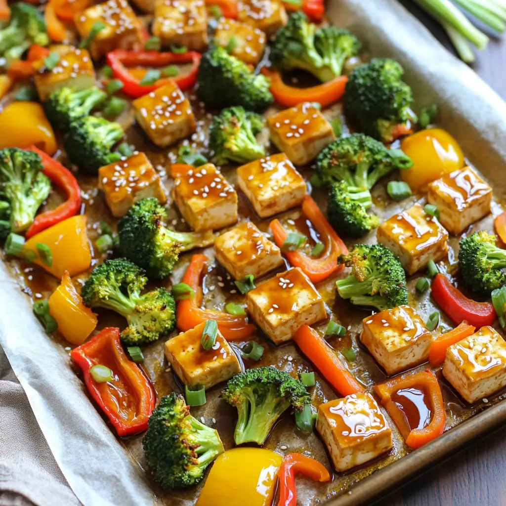 - 1 block (14 oz) firm tofu, pressed and cubed - 1 cup broccoli florets - 1 cup bell peppers (assorted colors), sliced - 1 cup carrots, thinly sliced - 3 tablespoons teriyaki sauce - 2 tablespoons soy sauce - 1 tablespoon olive oil - 2 cloves garlic, minced - 1 teaspoon fresh ginger, grated - 1 tablespoon sesame seeds - 3 green onions, sliced (for garnish) - Salt and pepper to taste Gather these fresh ingredients to make a tasty dish. The firm tofu gives the meal a nice texture. Broccoli adds crunch, while bell peppers offer sweetness. Carrots bring color and flavor. For the marinade, teriyaki sauce gives a rich taste. Soy sauce adds depth, and olive oil helps blend everything. Minced garlic and grated ginger boost the flavor even more. Finally, sesame seeds and green onions make great garnishes. They add a pop of flavor and make the dish look pretty. Salt and pepper enhance all the tastes, making every bite delightful. - Preheat the oven to 425°F (220°C). - Line a large baking sheet with parchment paper for easy cleanup. - Combine teriyaki sauce, soy sauce, olive oil, minced garlic, and grated ginger in a bowl. - Mix well to ensure every ingredient blends nicely. - Coat the cubed tofu with the marinade. - Allow it to marinate for at least 10 minutes for better flavor. - Toss broccoli, bell peppers, and carrots with olive oil, salt, and pepper. - Make sure they are evenly coated for great taste. - Spread tofu and veggies on the baking sheet. - Bake for 25-30 minutes, stirring halfway through. - Once baked, sprinkle sesame seeds over the top. - Serve with sliced green onions for a fresh finish. To get the best texture from your tofu, start by pressing it. Pressing removes excess water. This helps the tofu absorb flavors better. Wrap the tofu in a clean towel. Place a heavy object on top. Leave it for about 15 minutes. After pressing, cut the tofu into cubes. For marination, let the cubed tofu soak in the sauce for at least 10 minutes. This time allows the tofu to soak up the teriyaki and soy sauce. The longer it marinates, the tastier it gets. You can even marinate it overnight for more flavor. When choosing vegetables, think about color and texture. Broccoli, bell peppers, and carrots work well. They all roast nicely and add great flavor. You can also try zucchini, snap peas, or sweet potatoes. Cut the veggies into similar sizes. This helps them cook evenly. For example, slice the bell peppers into strips and cut the carrots thin. This way, they will roast at the same rate. Stir the tofu and veggies halfway through baking. This helps them cook evenly and get crispy. Check for doneness by looking for golden tofu and tender veggies. If the tofu is golden brown, it's ready. The veggies should be vibrant and soft, but not mushy. Adjust baking time as needed. {{image_2}} You can switch the tofu for other proteins. Chicken works great for meat lovers. Simply cut it into bite-sized pieces. Tempeh is a fantastic option too. It has a nutty flavor and adds protein. For a seafood twist, try shrimp. Shrimp cooks quickly, so adjust your bake time. Feel free to experiment with your favorite protein! While teriyaki sauce is tasty, you can try other sauces. Hoisin sauce adds a sweet kick. Soy sauce mixed with honey gives a nice glaze. For a spicy twist, use sriracha mixed with soy sauce. Each sauce brings its own flavor. Mix and match until you find your perfect blend. Using seasonal veggies can boost your meal's freshness. In spring, add asparagus or snap peas. Summer brings zucchini and corn, which brighten the dish. Fall is perfect for sweet potatoes or Brussels sprouts. Winter vegetables like cauliflower or kale add heartiness. Customize your mix based on what’s in season! Store your leftover Sheet-Pan Teriyaki Tofu and Veggies in an airtight container. Make sure to let it cool before sealing. This helps keep the flavors fresh. You can keep it in the fridge for about 3 to 4 days. After that, the tofu may lose its great taste and texture. To freeze this dish, first let it cool completely. Then, place it in a freezer-safe container. You can also use freezer bags for easy storage. Label the bags with the date to track freshness. This meal can last up to 2 months in the freezer. When ready to eat, thaw it overnight in the fridge. To reheat, the oven works best. Preheat it to 350°F (175°C). Spread the tofu and veggies on a baking sheet. Heat for about 15 to 20 minutes until warm. You can also use a microwave, but be careful. It may make the tofu a bit soft. If you prefer, use a skillet to heat it up on the stove. This keeps the texture crisp. It takes about 15 minutes to prep. The total cooking time is around 30 minutes. So, you can enjoy this dish in just 45 minutes. This quick time makes it perfect for busy weeknights. Yes, you can use frozen vegetables. Frozen veggies are easy and save time. However, fresh veggies taste better. If you choose frozen, add them straight from the bag. No need to thaw them first. Just adjust the cooking time, as frozen veggies may need a few extra minutes. This recipe is not gluten-free. Regular soy sauce contains gluten. To make it gluten-free, use tamari instead of soy sauce. Tamari tastes great and works well in this dish. Look for tamari in most grocery stores. Yes, this recipe is vegan. All the ingredients are plant-based. The tofu, veggies, and sauces are all vegan-friendly. You can enjoy this meal without any worry about animal products. You can serve this dish with steamed rice. White, brown, or jasmine rice all work well. You can also pair it with quinoa or a side salad. These options make the meal more filling and tasty. This blog post detailed a simple way to make Sheet-Pan Teriyaki Tofu and Veggies. We covered the ingredients, marinade, and baking steps. I shared tips on perfecting tofu and options for protein swaps. You have ideas for using seasonal vegetables and storage. Finally, we answered common questions about prep times and vegan choices. Get ready to enjoy a tasty, healthy meal that is quick and easy!