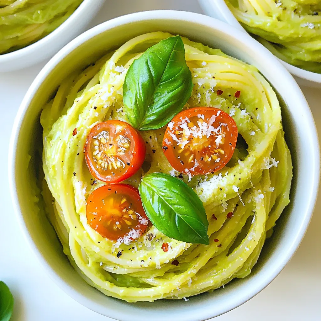 - 12 oz pasta (spaghetti or fettuccine) - 2 ripe avocados, pitted and scooped - 2 cloves garlic, minced - 1 lemon, juiced - ¼ cup olive oil - ½ cup fresh basil leaves - ¼ cup grated Parmesan cheese (or nutritional yeast for a vegan option) - Salt and pepper to taste - Red pepper flakes (optional, for heat) - Cherry tomatoes, halved (for garnish) - Extra basil leaves for garnish This creamy avocado pasta shines with fresh ingredients. You’ll want to choose your pasta type first. Spaghetti and fettuccine work well. I love the way fettuccine holds the sauce. Next, the star of the dish is the avocado. Use ripe avocados for that creamy texture. You’ll also need garlic for flavor. Fresh garlic adds a nice kick. Don’t forget the lemon juice! It brightens the dish and helps the avocado stay green. Olive oil adds richness and smoothness. Fresh basil leaves give depth and aroma. Grated Parmesan cheese enhances the taste. If you're vegan, swap it with nutritional yeast. You can spice things up with red pepper flakes if you like heat. Cherry tomatoes add a pop of color and sweetness. Extra basil leaves make the dish look fresh and appealing. Gather these ingredients, and you are ready to create a quick and tasty meal! {{ingredient_image_1}} 1. Start by bringing a large pot of salted water to a boil. This adds flavor to the pasta. 2. Add 12 ounces of your choice of pasta, like spaghetti or fettuccine. Cook it according to the package instructions. Aim for al dente, which means it should be firm but cooked through. 3. Once cooked, reserve 1 cup of that pasta water. This water is starchy and will help the sauce stick later. Drain the pasta and set it aside. 1. While the pasta cooks, grab your food processor. Add 2 ripe avocados, 2 minced garlic cloves, the juice of 1 lemon, ¼ cup olive oil, ½ cup fresh basil leaves, and ¼ cup grated Parmesan cheese. 2. Blend all these ingredients until the mixture is smooth and creamy. If it's too thick, slowly add some reserved pasta water, a tablespoon at a time, until you reach your desired consistency. 3. To ensure the sauce is silky, make sure to blend long enough. Scrape down the sides of the processor if needed. 1. Put the drained pasta back in the large pot. Pour the creamy avocado sauce over the pasta. 2. Gently toss the pasta and the sauce together. Use a spatula to coat all the noodles evenly. If the sauce feels too thick, add more reserved pasta water to loosen it. 3. Finally, season with salt, pepper, and red pepper flakes if you like a little heat. Mix well to combine all the flavors. To make your creamy avocado pasta look great, try these tips: - Plating Method: Serve the pasta in wide bowls. This gives a nice view of the dish. - Garnish Ideas: Top with halved cherry tomatoes for color. Add fresh basil leaves for a burst of flavor. Avocados are a powerhouse of nutrition. Here’s what you need to know: - Nutritional Profile: They are rich in healthy fats, fiber, and vitamins. One avocado has good fats that help your heart. - Diet Benefits: Adding avocados can improve skin health and aid digestion. They keep you full longer, which can help with weight management. Avoid these common pitfalls for the best results: - Overcooking Pasta: Be careful not to cook pasta too long. Aim for al dente to keep it firm and tasty. - Sauce Thickness: If your sauce is too thick, add some reserved pasta water. This helps it blend well with the pasta. Pro Tips Use Ripe Avocados: Ensure your avocados are perfectly ripe for the creamiest sauce. They should yield slightly to gentle pressure when squeezed. Reserve Pasta Water: Always save some pasta water before draining. This starchy water can help thin out your sauce and improve its adherence to the pasta. Add Freshness: For an extra burst of flavor, consider adding some lemon zest to the sauce for bright acidity and fragrance. Customize Your Greens: Feel free to mix in other herbs like parsley or cilantro along with the basil for a unique twist on the flavor profile. {{image_2}} You can easily make this dish vegan. To do this, replace the Parmesan cheese with nutritional yeast. Nutritional yeast adds a cheesy flavor without using dairy. You can also add ingredients like sun-dried tomatoes or olives. These will bring more depth to your dish. For gluten-free options, choose pasta made from rice or corn. Many brands offer great gluten-free spaghetti or fettuccine. When making the sauce, ensure all ingredients are gluten-free. This way, you can enjoy a creamy meal without worry. You can boost this pasta with protein. Adding chicken or shrimp makes it heartier. Cook these proteins separately and mix them in at the end. You can also add spices for more taste. Try fresh herbs like parsley or spices like paprika. These will take your dish to the next level. To keep creamy avocado pasta fresh, store it in the fridge. Use airtight containers. This helps keep flavors and textures intact. Make sure to seal them tightly to prevent air from getting in. Leftovers can last up to three days. Before eating, check for any signs of browning or off smells. When reheating, avoid drying out the pasta. You can use the microwave or stovetop. For microwave reheating, place pasta in a bowl. Add a splash of water to keep it moist. Heat in short bursts, stirring in between. For stovetop, add the pasta to a pan. Add a little olive oil or water, and heat over low until warm. Stir often to keep it creamy. You can freeze creamy avocado pasta, but it may change texture. If you want to freeze it, do so right after making. Use freezer-safe containers and leave space for expansion. When you are ready to eat, thaw overnight in the fridge. Reheat gently using the stovetop method to restore creaminess. Avoid refreezing once thawed. To keep your cut avocados fresh, store them in an airtight container. Press plastic wrap against the flesh to limit air exposure. You can also sprinkle a little salt on the cut side. This helps slow down browning. Lemon juice acts as a great preservative. The acid in lemon juice slows oxidation. Simply squeeze some juice over the exposed flesh before storing. This method works well for guacamole too. Yes, you can use frozen avocados. They work well in creamy dishes like this pasta. Thaw them overnight in the fridge or use the microwave for a quicker option. When using frozen avocados, make sure to remove the skin before freezing. This way, they blend smoothly into the sauce. You might need to adjust the amount of lemon juice or olive oil for flavor. To boost protein in your creamy avocado pasta, try adding tofu or beans. Cubed baked tofu adds a nice texture. White beans or chickpeas blend well with the sauce too. If you prefer meat, grilled chicken or shrimp are great options. They add flavor and make the dish heartier. You can also sprinkle some cooked bacon bits for extra crunch. This blog post covered how to make creamy avocado pasta. We discussed the ingredients, step-by-step instructions, and helpful tips. You learned to select the right pasta and avoid common mistakes. We explored variations, storage tips, and answers to FAQs. Try this recipe for a quick, healthy meal. Enjoy the creamy texture and delicious flavor of avocados, all while boosting your diet! Whether you're vegan or gluten-free, there's a tasty option for you. Get cooking and savor every bite!