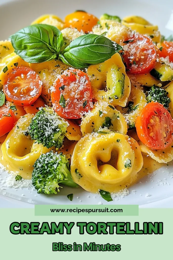 Indulge in this Creamy Tortellini Primavera, a cheesy tortellini recipe bursting with vibrant vegetables. This easy tortellini pasta dish features cheese tortellini tossed in a luscious creamy sauce with fresh cherry tomatoes, bell peppers, zucchini, and broccoli. Perfect for a quick meal, this creamy pasta recipe is a family favorite. Try it today and make dinner a breeze! Save this recipe for later! #CreamyTortellini #CheesyTortellini #EasyPasta #VegetableDish