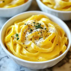 To make Creamy Pumpkin Alfredo Pasta, you need the following ingredients: - 12 oz fettuccine pasta - 1 cup pumpkin puree (canned or homemade) - 1 cup heavy cream - 1/2 cup grated Parmesan cheese - 1 teaspoon garlic powder - 1/2 teaspoon nutmeg - 1/2 teaspoon black pepper - 1/4 teaspoon salt (to taste) - 2 tablespoons olive oil - Fresh parsley for garnish Each ingredient plays a key role in creating this rich and flavorful meal. The fettuccine pasta gives a nice base for the sauce. Pumpkin puree adds a creamy texture and a hint of sweetness. Heavy cream makes the sauce rich and smooth. Parmesan cheese adds a salty, nutty flavor that blends well with pumpkin. Garlic powder brings out the savory notes, while nutmeg adds warmth. Black pepper gives a little kick. Salt helps enhance all these flavors. Olive oil is essential for cooking the puree and brings a fruity note. Finally, fresh parsley adds a pop of color and freshness on top. Make sure to gather all your ingredients before starting. This will help you cook smoothly and enjoy the process. {{ingredient_image_1}} To cook fettuccine to al dente, start with a large pot of boiling salted water. Add your 12 oz of fettuccine and stir it well. Check the package for cooking time, usually about 8 to 10 minutes. Taste a piece to see if it has a slight bite. That’s the al dente you want! After cooking, drain the pasta. Don’t forget to save 1/2 cup of that starchy pasta water. This water is gold for your sauce. In a large skillet, heat 2 tablespoons of olive oil over medium heat. Once hot, add 1 cup of pumpkin puree. Stir it for about 2 minutes to warm it up. Then, lower the heat and slowly pour in 1 cup of heavy cream. Mix it well until blended. Next, gradually add 1/2 cup of grated Parmesan cheese. Keep stirring until it melts and the sauce is creamy. This step is key for a rich flavor. Now it's time to bring it all together! Add the drained fettuccine to the skillet with the pumpkin Alfredo sauce. Toss gently to coat each piece of pasta. If the sauce feels too thick, add a splash of your reserved pasta water. This will help you reach that perfect creamy consistency. You want every bite to be delicious and well-coated! To keep your sauce creamy, watch the heat. Use medium-low heat when adding the cream. If it gets too hot, it might separate. Stir slowly and keep it smooth. You can adjust the seasoning to fit your taste. If you love garlic, add more garlic powder. If you want it spicy, sprinkle in some cayenne pepper. Always taste as you go. This helps you find the best flavor. Garnishing adds a nice touch. Use fresh parsley to sprinkle on top. It brings color and freshness to your dish. You can also add extra Parmesan for a cheesy finish. Serve in deep bowls for an elegant look. Drizzle a bit of olive oil on top. This simple step makes your meal look fancy and inviting. Pro Tips Use Fresh Pumpkin: If possible, use fresh pumpkin instead of canned for a richer flavor. Roast and puree it for the best results. Adjust Consistency: If the sauce is too thick, gradually add the reserved pasta water until you achieve your desired creaminess. Enhance Flavor: Add a pinch of cinnamon or clove for an extra layer of warmth and complexity in the sauce. Garnish Wisely: Fresh herbs like sage or thyme can elevate the dish; consider tossing some in before serving for added aroma. {{image_2}} You can make this dish fit many diets. For vegan options, use dairy-free cream and cheese. This change keeps the dish creamy without animal products. You can find these in most stores. They taste great and still blend well with the pumpkin. If you need gluten-free pasta, try rice or corn pasta. These options cook well and hold the sauce nicely. You'll still enjoy the rich taste of the Alfredo sauce with pumpkin. To add more flavor, toss in sautéed vegetables. Spinach and mushrooms work well. They add texture and nutrients. Just sauté them in olive oil before mixing them into the sauce. You can also spice it up! Add cayenne for heat or Italian seasoning for a twist. A pinch of these spices brings new life to the creamy sauce. Just start with a little and adjust to your taste. To keep your creamy pumpkin Alfredo pasta fresh, follow these steps: - Cool the leftovers: Let the pasta sit at room temperature for about 30 minutes. This helps prevent condensation in the container. - Use airtight containers: Store the pasta in a glass or plastic container with a tight lid. This keeps moisture out and food safe. - Refrigerate promptly: Place the container in the fridge within two hours. This helps prevent bacterial growth. Reheating pasta can be tricky. You want it warm without drying out. Here are some great methods: - Stovetop method: Add the pasta to a skillet over low heat. Add a splash of water or cream to help it stay moist. Stir gently until warm. - Microwave method: Place the pasta in a microwave-safe dish. Add a little cream or water. Cover with a damp paper towel to trap steam. Heat in 30-second intervals, stirring in between, until hot. - Oven method: Preheat your oven to 350°F (175°C). Place the pasta in a baking dish, cover with foil, and heat for about 15 minutes. This keeps the pasta from drying out. These methods keep your creamy pumpkin Alfredo pasta delicious and ready to enjoy again! Can I use other types of pasta? Yes, you can use other pasta shapes. Penne, rigatoni, or even whole wheat pasta work well. Just adjust the cooking time based on the type you choose. Is this dish suitable for meal prep? Absolutely! Creamy Pumpkin Alfredo Pasta is great for meal prep. Store it in airtight containers in the fridge for up to three days. Just reheat gently on the stove or in the microwave. What can I substitute for pumpkin puree? If you don't have pumpkin puree, try using butternut squash puree or sweet potato puree. Both options will give a similar creamy texture and flavor. How do I make it spicier? To spice it up, add a pinch of cayenne pepper or red pepper flakes. You can also mix in some chopped jalapeños for a fresh kick. Adjust the heat to your liking! Creamy Pumpkin Alfredo Pasta is a simple and tasty dish you can make at home. We covered key ingredients, step-by-step cooking, and helpful tips for perfecting it. Remember to customize the recipe with your favorite mix-ins or adjust for dietary needs. Store leftovers carefully for quick meals later. Enjoy making this creamy dish anytime you crave comfort food!