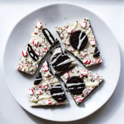 To make Oreo Peppermint Bark, you need a few simple ingredients. Here&rsquo;s what you will need: - 12 Oreo cookies, crushed - 2 cups white chocolate chips - 1 teaspoon peppermint extract - 1/2 cup crushed peppermint candies (or candy canes) - 1 tablespoon coconut oil (optional) Each item plays a key role. The Oreo cookies give a rich, chocolatey taste. The white chocolate chips melt into a creamy layer. Peppermint extract adds fresh flavor, making it feel like the holidays. Crushed peppermint candies add crunch and color. Coconut oil helps the chocolate stay smooth and shiny, but it&rsquo;s not a must. You can find all these ingredients at your local store. Gather them together, and you are ready to start making this festive treat! {{ingredient_image_1}} First, get your baking sheet ready. Line it with parchment paper or a silicone mat. This step stops the bark from sticking. Make sure it covers the whole sheet. Next, you will melt the white chocolate. In a microwave-safe bowl, add the white chocolate chips. If you want, add coconut oil for smoothness. Microwave it in 30-second bursts. Stir the mix each time. Keep going until it is smooth and melted. Now, it&rsquo;s time to add flavor! Stir in the peppermint extract. Mix well until it is all combined. You want that fresh peppermint taste in every bite. Gently fold in the crushed Oreo cookies. Make sure to save about 1/4 cup of them for later. This will add a nice crunch on top of your bark. Pour the chocolate-Oreo mix onto the baking sheet. Use a spatula to spread it out evenly. Aim for about 1/4 inch thick. This thickness helps it set nicely. Sprinkle the crushed peppermint candies over the chocolate layer. Add the reserved Oreo crumbs too. Press them down slightly. This helps them stick to the bark. Place the baking sheet in the fridge. Let it chill for 1 to 2 hours. You want the bark to be firm and set completely. Once it is set, take it out of the fridge. Break the bark into pieces. You can make them as big or small as you like. Enjoy your homemade Oreo Peppermint Bark! To melt chocolate well, use a microwave-safe bowl. Combine chocolate chips and coconut oil. Heat in short bursts, like 30 seconds. Stir between each interval. This keeps the chocolate from burning. When melted, it should be smooth and shiny. If it gets too thick, add a little coconut oil. This helps it stay creamy. To get the best texture, make sure the chocolate is fully melted. Stir it well to mix in the peppermint. When you fold in the Oreos, do it gently. This keeps the cookies from breaking too much. You want nice chunks of Oreo in the bark. Press the toppings lightly into the chocolate. This helps them stick better when it sets. For a beautiful presentation, cut the bark into even pieces. Place the pieces on a festive platter. You can drizzle melted white chocolate over them for flair. Another fun idea is to package them in clear bags. Tie them with a ribbon for gifts. This adds a personal touch and makes them look special. Enjoy sharing your Oreo Peppermint Bark! Pro Tips Use Quality Chocolate: Opt for high-quality white chocolate chips for the best flavor and smooth melting. Avoid generic brands that may not melt well. Chill Between Layers: If you're adding multiple layers or toppings, chill the bark briefly in the refrigerator to help them adhere better and prevent mixing. Customize Your Toppings: Feel free to experiment with different toppings such as crushed nuts, sprinkles, or even drizzles of dark chocolate for added flavor and texture. Store Properly: Keep your Oreo Peppermint Bark in an airtight container at room temperature for up to two weeks to maintain its freshness and crunch. {{image_2}} You can change the chocolate in your Oreo Peppermint Bark. While white chocolate is sweet and creamy, you might enjoy dark chocolate too. Dark chocolate adds a rich taste that balances the sweetness. You can also use milk chocolate for a classic twist. Each type of chocolate brings a new flavor to the bark. Add different flavors to your bark for fun. For example, try orange zest for a citrus kick. Almond extract could give your bark a nutty flavor. You can also add a pinch of sea salt for a sweet-salty mix. These flavors will make your bark stand out at any holiday party. Mix in seasonal treats for extra fun. In the fall, add crushed candy corn or pumpkin spice. For spring, try adding pastel sprinkles or mini eggs. You can also use dried fruits like cranberries or cherries for a burst of color and taste. These mix-ins will make your Oreo Peppermint Bark a treat for all seasons. To keep your Oreo Peppermint Bark fresh, store it in an airtight container. This helps keep moisture out. You can layer the bark pieces with parchment paper. This prevents them from sticking together. If you have many pieces, consider using a larger container. Oreo Peppermint Bark lasts about two weeks at room temperature. If you store it in the fridge, it can last up to three weeks. You can also freeze the bark. Wrap it tightly in plastic wrap, then place it in a freezer bag. It can last up to three months in the freezer. To enjoy later, thaw it in the fridge overnight. To keep the bark fresh, always use a clean, dry utensil when taking pieces. Avoid leaving it out in warm areas, as heat can cause it to melt. If you notice any moisture, dry the container before placing the bark inside. This helps maintain its texture and flavor. Yes, you can use dark or milk chocolate. Each type gives a different taste. Dark chocolate adds rich flavor, while milk chocolate is sweeter. Adjust the amount of peppermint extract for balance. Start with the same amount and taste it. You can always add more if needed. Oreo Peppermint Bark can last up to two weeks if stored properly. Keep it in an airtight container. This keeps moisture out and preserves the taste. If you want to store it longer, you can freeze it. Just wrap it well to prevent freezer burn. Absolutely! Oreo Peppermint Bark is great to make ahead. You can prepare it days or even weeks in advance. Store it in an airtight container. It will stay fresh and tasty. This makes it easy to enjoy during the busy holiday season. This blog post covered how to make Oreo Peppermint Bark. We talked about the ingredients, like Oreos and white chocolate. I shared step-by-step instructions for easy baking and tips for the best results. You learned fun variations and how to store your tasty treat. Enjoy making this easy and festive dessert. It will surely wow your friends and family!