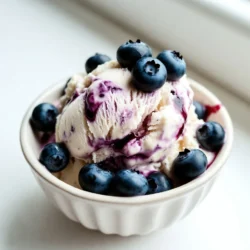 - 1 cup fresh blueberries - 1 cup cream cheese, softened - 1 cup heavy cream - 3/4 cup sweetened condensed milk - 1 teaspoon vanilla extract - 1/4 cup granulated sugar - 1/2 teaspoon lemon juice - A pinch of salt When choosing blueberries, look for firm, plump berries. They should be deep blue with a light bloom. Fresh berries give the best flavor. For cream cheese, select a quality brand. It should be soft but not runny. Heavy cream must have a high fat content for the best creaminess. Always check the label for freshness. If you need a dairy-free option, use a vegan cream cheese. Coconut cream works well as a substitute for heavy cream. For sweeteners, consider maple syrup or agave if you want a natural option. Keep in mind that these changes may alter the flavor and texture slightly. {{ingredient_image_1}} To start, gather your blueberries and sugar. In a medium saucepan, mix 1 cup of fresh blueberries with 2 tablespoons of sugar. Heat this over medium heat. Cook until the blueberries burst, about 5-7 minutes. You will see their juices flow out. Once done, remove the pan from heat and let the mixture cool. This adds a sweet, fruity burst to your ice cream. Next, take a mixing bowl and add 1 cup of softened cream cheese. Blend in the remaining sugar until the mix is smooth and creamy. It should look thick and velvety. Now, add 1 cup of heavy cream, 3/4 cup of sweetened condensed milk, 1 teaspoon of vanilla extract, 1/2 teaspoon of lemon juice, and a pinch of salt. Mix this well until everything is combined. This creates a rich and tasty cheesecake base. Now, it&rsquo;s time to fold in that cooled blueberry mixture. Carefully mix it in, but save some whole berries for texture. Pour the final mix into your ice cream maker. Churn it according to the manufacturer's instructions. You want a soft-serve consistency. Once ready, transfer the ice cream to an airtight container. Freeze it for at least 4 hours or until firm. Before serving, let it sit at room temperature for a few minutes. This makes scooping easier and gives you that creamy delight. To get a smooth and creamy texture, use softened cream cheese. This helps it blend well. When mixing, make sure there are no lumps. The heavy cream also adds richness. Churn the mixture until it feels fluffy. If your ice cream maker has a setting, use the soft-serve option. This gives you a light texture that feels great in your mouth. You can make this ice cream even better. Try adding a swirl of blueberry sauce. This adds more berry flavor and looks lovely. A bit of zest from lemon can brighten the taste. If you like a touch of spice, add a pinch of cinnamon. These small changes make a big difference. Serve your blueberry cheesecake ice cream in waffle cones for a fun touch. You can also use bowls if you prefer. Top it with fresh blueberries for a burst of color. A drizzle of blueberry sauce on top makes it extra special. You can even add whipped cream if you want. Enjoy this treat with friends or family for a fun dessert night! Pro Tips Use Frozen Blueberries: If fresh blueberries are not available, you can substitute with frozen ones. Just make sure to thaw and drain any excess liquid before using them in the recipe. Chill Your Equipment: For an even creamier texture, chill your ice cream maker bowl and mixing utensils in the freezer for about 30 minutes before starting. Experiment with Flavors: Add a touch of cinnamon or nutmeg to the ice cream mixture for a warm spice note that complements the blueberries beautifully. Storage Tips: For best results, store the ice cream in a shallow container. This helps it freeze faster and makes it easier to scoop. {{image_2}} You can change the flavor of your blueberry cheesecake ice cream by adding other fruits. Strawberries, raspberries, or peaches work great. Simply replace blueberries with your chosen fruit in the recipe. Cook them the same way until they are soft and juicy. This way, you can explore new tastes while enjoying the creamy texture. If you want a vegan or dairy-free option, swap out the cream cheese and heavy cream. Use cashew cream or coconut cream instead. Both give a rich, creamy feel. For the sweetened condensed milk, try a dairy-free version made from coconut milk. These changes will keep the ice cream delicious without using any dairy. If you don&rsquo;t have an ice cream maker, you can still make this treat. Combine all the ingredients in a bowl, just like the regular recipe. Pour the mix into a baking dish and freeze it. Stir it every 30 minutes for the first few hours. This keeps it smooth and creamy. After about 4 hours, it will be ready to scoop and enjoy! To keep your blueberry cheesecake ice cream fresh, store it in an airtight container. This helps prevent ice crystals from forming. Pack the ice cream tightly to reduce air pockets. A good tip is to press a piece of plastic wrap on the surface before sealing the lid. This extra layer helps keep it creamy and delicious. When stored properly, your ice cream can last about two months in the freezer. After that, it may lose flavor and texture. Signs of spoilage include ice crystals on the surface and a change in color. If you notice a grainy texture, it&rsquo;s time to say goodbye to the ice cream. If your ice cream melts, you can refreeze it, but do so with care. Stir the mixture before refreezing to help restore its creaminess. Remember, repeated thawing and freezing can affect the texture. Try to only thaw the amount you plan to enjoy right away. This way, you keep your blueberry cheesecake ice cream tasting fresh and delightful! Yes, you can use frozen blueberries. They work well in the recipe. However, they may release more juice. This can make the ice cream a little softer. If you choose frozen, let them thaw first. Drain any excess juice before mixing them into the cream. It takes about 4 hours for the ice cream to freeze. After churning, transfer it to an airtight container. This helps keep the ice cream fresh. For the best texture, let it freeze until firm. If you want to scoop it easily, let it sit out for a few minutes. Yes, you can make this ice cream without a machine. After mixing the ingredients, pour them into a shallow dish. Place it in the freezer. Stir every 30 minutes for the first 2 hours. This helps break up ice crystals and keeps it creamy. After a few hours, it will be ready to enjoy! You now know how to create a delicious blueberry cheesecake ice cream. We covered essential ingredients, best practices, and how to make the base. You learned tips for texture and flavor enhancement, plus variations for different diets. Remember proper storage tips to keep your treat fresh. This ice cream is fun to make and enjoy. With your newfound skills, impress friends and family. Dive into the kitchen and start churning today!