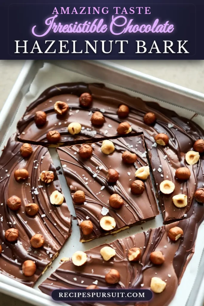 Satisfy your sweet cravings with this easy chocolate dessert: homemade chocolate hazelnut bark! This dark chocolate bark recipe combines rich dark and creamy milk chocolate with roasted hazelnuts, creating a decadent treat that's perfect for sharing. Make this chocolate bark with nuts for a delightful snack or dessert. Save this recipe for a simple, indulgent treat! #ChocolateHazelnutBark #ChocolateBarkWithNuts #EasyChocolateDessert #HomemadeChocolateTreat