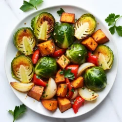 - 2 cups brussels sprouts - 1 large sweet potato - 1 red bell pepper - 1 yellow onion - 3 cloves garlic - 3 tablespoons honey - 2 tablespoons olive oil - 1 teaspoon dried thyme - Salt and pepper - Fresh parsley for garnish For this honey garlic roasted vegetables recipe, you need fresh ingredients. Start with brussels sprouts, sweet potato, bell pepper, and onion. The brussels sprouts should be halved. Cut the sweet potato into cubes. Chop the bell pepper and quarter the onion. The garlic gives a strong flavor. Use three cloves, minced well. Honey adds a sweet touch. You will need three tablespoons. For richness, use two tablespoons of olive oil. Dried thyme adds an herby note. Season with salt and pepper to taste. Finally, fresh parsley will make your dish look nice and bright. Using fresh ingredients ensures the best flavor. This dish is colorful and healthy. It&rsquo;s perfect for any meal. You can even serve it as a side dish for dinner. {{ingredient_image_1}} First, preheat your oven to 425&deg;F (220&deg;C). This high heat helps the veggies get nice and crispy. Next, line a large baking sheet with parchment paper. This makes cleanup easy and helps the veggies roast evenly. In a large mixing bowl, combine the halved brussels sprouts, cubed sweet potato, chopped red bell pepper, and quartered onion. Make sure to mix them well. This way, every veggie gets coated with flavor later on. Now, let&rsquo;s make the honey garlic sauce. In a small bowl, whisk together three cloves of minced garlic, three tablespoons of honey, and two tablespoons of olive oil. Add one teaspoon of dried thyme, salt, and pepper to taste. Mix until it&rsquo;s all combined. This sauce will add a sweet and savory punch to your roasted vegetables. Pour the honey garlic mixture over the veggies in the bowl. Toss the vegetables well until they are evenly coated with the sauce. Spread the coated veggies out in a single layer on your prepared baking sheet. Roast the vegetables in the preheated oven for about 25-30 minutes. Stir them halfway through cooking. This helps them cook evenly and caramelize nicely. Once they are tender and golden, take them out and let them cool slightly. Enjoy the wonderful aroma filling your kitchen! Roasting vegetables can be simple and fun. Here are some tips to help you succeed: - Choose Fresh Veggies: Start with fresh brussels sprouts, sweet potatoes, bell peppers, and onions. Fresh produce tastes best. - Cut Evenly: Make sure all your veggies are cut to the same size. This helps them cook evenly. - Use Parchment Paper: Lining your baking sheet with parchment paper makes cleanup easier and helps prevent sticking. - Toss Well: After adding the honey garlic sauce, toss the veggies well. This ensures every bite is full of flavor. - Stir Midway: Stir the veggies halfway through cooking. This helps them roast evenly and prevents burning. Presentation can make your dish shine. Here are some ideas: - Use a Platter: Serve the roasted veggies on a large platter. This allows guests to see the colorful mix. - Drizzle Sauce: Pour any leftover honey garlic sauce over the veggies. This adds extra flavor and makes it more appealing. - Garnish with Parsley: Sprinkle fresh parsley on top for a pop of color. It also adds a fresh taste. - Pair with Proteins: These veggies work well with grilled chicken, fish, or tofu. Serve them alongside your favorite protein for a complete meal. - Add a Grain: Consider serving these veggies with rice or quinoa. This brings more texture and nutrition to your plate. Pro Tips Use Fresh Vegetables: For the best flavor and texture, use fresh, seasonal vegetables. This enhances the overall taste of the dish. Adjust Sweetness: Feel free to adjust the amount of honey based on your preference for sweetness. You can also substitute with maple syrup for a different flavor. Mix and Match: Experiment with different vegetables such as carrots, zucchini, or cauliflower based on what you have on hand or your personal taste. Store Leftovers Properly: If you have leftovers, store them in an airtight container in the refrigerator for up to 3 days. Reheat in the oven for the best texture. {{image_2}} If you want to switch things up, try different veggies. Instead of brussels sprouts, use broccoli or cauliflower. Carrots or zucchini can add color and taste, too. You can also swap the sweet potato for butternut squash for a sweet twist. When it comes to sweeteners, honey is great, but maple syrup works well, too. Agave nectar or brown sugar can add a unique flavor. Just remember to adjust the amount, as some sweeteners are sweeter than honey. To make your dish pop, consider adding spices. A pinch of cayenne pepper can add heat. Smoked paprika gives a nice, deep flavor. You can also use fresh herbs like rosemary or basil for a fragrant touch. Adding nuts or seeds can give your vegetables a nice crunch. Try tossing in some toasted almonds or sunflower seeds. They add texture and make the dish more filling. You can also sprinkle some sesame seeds before serving for extra flavor and flair. To store your honey garlic roasted vegetables, let them cool first. Place them in an airtight container. Make sure to cover the container tightly. This keeps the veggies fresh and tasty. In the fridge, they can last for about 3 to 5 days. If you want to keep them longer, consider freezing. Just make sure to use a freezer-safe container. When you are ready to enjoy the leftovers, reheating them is easy. The best way is to use the oven. Preheat your oven to 350&deg;F (175&deg;C). Spread the vegetables on a baking sheet. Heat for about 10-15 minutes until they are warm. You can also use a microwave if you're in a hurry. Place them in a microwave-safe dish and cover. Heat for 1-2 minutes, stirring halfway. This method works well, but the oven gives better texture. Honey garlic roasted vegetables can last for about 3 to 5 days in the fridge. Make sure to store them in an airtight container. This keeps them fresh and tasty. If you want to enjoy them later, let them cool first before putting them away. Yes, you can use fresh garlic instead of minced. Just chop the fresh garlic into small pieces. Fresh garlic has a strong flavor. You may want to adjust the amount to suit your taste. Usually, one clove of fresh garlic is about one teaspoon of minced. You can use many different vegetables in this recipe. Some great choices include carrots, zucchini, and cauliflower. These vegetables roast well and soak up the honey garlic flavor nicely. Feel free to mix and match based on what you have at home or what is in season. This blog post covered a tasty recipe for honey garlic roasted vegetables. We listed all the ingredients, provided step-by-step instructions, and shared valuable tips. Each part helps you create a delicious dish that is fun to make and share. Remember to play with different veggies and flavors to make it your own. Enjoy your cooking journey and savor every bite!