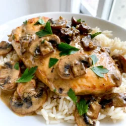 - 4 boneless, skinless chicken breasts - 1 tablespoon olive oil - 1 medium onion, finely chopped - 3 cloves garlic, minced - 8 oz (225g) mushrooms, sliced - 1 cup heavy cream - 1 cup chicken broth - 1 teaspoon dried thyme - 1 teaspoon paprika - Salt and pepper to taste - Fresh parsley, chopped This dish shines with simple ingredients. Each one plays a key role. The chicken breasts are lean and tender. They soak up the rich sauce well. The olive oil helps achieve a nice sear on the chicken. This adds flavor right from the start. Onions bring sweetness and depth. When cooked, they soften and release their juices. Garlic adds a strong aroma and taste. You can never have too much garlic in a creamy sauce. It enhances the overall flavor profile. Mushrooms are essential here. They add a meaty texture and earthiness. You can use cremini or button mushrooms based on your taste. Both work well in this dish. Heavy cream creates a luscious sauce. It gives the dish its creamy texture. Chicken broth adds depth and richness. Together, they form the base of the sauce. Thyme and paprika introduce herbal and smoky notes. They lift the dish and make it more complex. Finally, salt and pepper balance everything out. Fresh parsley provides a pop of color and freshness on top. With these ingredients, you set yourself up for a fantastic meal. {{ingredient_image_1}} - Season the chicken breasts. Sprinkle salt, pepper, and paprika on both sides. This adds flavor. - Sear the chicken in the skillet. Heat olive oil over medium heat. Cook the chicken for 5-7 minutes on each side. You want it golden brown and cooked through. Once done, remove it from the skillet and set it aside. - Saut&eacute; the onion, garlic, and mushrooms. In the same skillet, add the chopped onion. Cook for 2-3 minutes until soft. Then, add minced garlic and sliced mushrooms. Cook for 5-6 minutes until the mushrooms are soft and caramelized. - Deglaze with chicken broth. Pour the chicken broth into the skillet. Scrape the bottom to release tasty bits. Let it simmer for 2-3 minutes. This adds depth to the sauce. - Add cream and thyme. Lower the heat and stir in the heavy cream and dried thyme. Let the sauce simmer gently for 5 minutes until it thickens. - Return chicken to the skillet. Place the cooked chicken back in the skillet. Spoon the creamy mushroom sauce over it. Allow it to heat through for 2-3 minutes. - Heat through and serve. Adjust seasoning with salt and pepper if needed. Enjoy your creamy garlic mushroom chicken! To ensure the chicken is cooked properly, use a meat thermometer. The chicken should reach 165&deg;F to be safe. This gives you juicy and tender meat every time. Sear the chicken until it turns golden brown. This adds flavor and keeps the juices inside. To avoid overcooking the mushrooms, watch them closely as they cook. Cook them just until they are soft and browned. This usually takes about 5-6 minutes. If you see them getting too dark, lower the heat or take them off the heat sooner. For extra flavor, consider adding thyme and paprika. These herbs give warmth and depth to your dish. You can also try fresh herbs like basil or rosemary for a twist. If you want to add a kick, sprinkle in some red pepper flakes. They bring heat without overpowering the dish. You could also use a dash of hot sauce or a pinch of cayenne pepper. These simple changes make the dish exciting and unique. Enjoy experimenting! Pro Tips Use Fresh Ingredients: Fresh mushrooms and garlic will enhance the flavor of your dish significantly, making it taste more vibrant and delicious. Don&rsquo;t Overcook the Chicken: To keep the chicken juicy and tender, avoid overcooking it. Use a meat thermometer to ensure it reaches an internal temperature of 165&deg;F (75&deg;C). Customize the Sauce: Feel free to add a splash of white wine or a teaspoon of Dijon mustard to the creamy sauce for an extra layer of flavor. Presentation Matters: Serve the dish in a shallow bowl and drizzle some extra sauce on top for a beautiful presentation. Garnish with parsley for a pop of color. {{image_2}} You can change the mushrooms in this dish to suit your taste. Cremini and button mushrooms work well, but you can try shiitake or portobello too. Each type adds its unique flavor. If you need a dairy-free version, use coconut cream or cashew cream instead of heavy cream. Both options keep the dish rich and creamy. You can also use almond milk with a thickener like cornstarch. This will help you achieve a similar texture without dairy. For those who love slow cookers, this dish adapts easily. Season the chicken and sear it first. Then, place it in the slow cooker with the onion, garlic, mushrooms, broth, and cream. Cook on low for 6-8 hours. This method makes the chicken very tender. If you prefer a quicker method, try the Instant Pot. Sear the chicken in the pot first. Then, add the onion, garlic, mushrooms, broth, and cream. Seal the lid and cook on high pressure for about 10 minutes. This saves time and keeps the flavors strong. These variations let you enjoy creamy garlic mushroom chicken your way. To keep your creamy garlic mushroom chicken fresh, follow these tips: - Refrigeration: Place leftovers in an airtight container. Store them in the fridge. They taste best within 3 days. - Freezing: For longer storage, freeze the chicken. Use a freezer-safe container. It can last up to 3 months. When it&rsquo;s time to enjoy your leftovers, here are the best ways to reheat: - Stovetop: Place the chicken in a skillet. Add a splash of broth or cream. Heat on low until warmed through. This keeps the sauce creamy. - Microwave: Use a microwave-safe dish. Cover with a lid or microwave-safe wrap. Heat in short bursts, stirring in between, until hot. Following these steps helps maintain the dish&rsquo;s rich flavors and creamy texture. Enjoy your meal! What can I serve with creamy garlic mushroom chicken? You can serve this dish with fluffy rice or pasta. Both soak up the sauce well. A side of steamed broccoli or a fresh green salad pairs nicely too. These sides balance the meal and add color to your plate. Can I use chicken thighs instead? Yes, chicken thighs work great in this recipe. They are juicy and flavorful. Just make sure to adjust the cooking time if needed. Thighs may take a bit longer to cook through than breasts. How do I make the sauce thicker? To thicken the sauce, let it simmer longer over low heat. You can also add a cornstarch slurry. Mix one tablespoon of cornstarch with two tablespoons of cold water. Stir this mixture into the sauce until it thickens. What to do if the sauce is too thin? If your sauce is too thin, simmer it longer to reduce the liquid. You can also mix in some grated cheese for extra creaminess. Both methods help create a rich, thicker sauce. Why is my chicken not tender? If your chicken is tough, it may have been overcooked. Cook the chicken just until done, and let it rest before cutting. This helps keep it juicy and tender. This recipe for creamy garlic mushroom chicken is simple and satisfying. You learned about the key ingredients and each step to make the dish. I shared tips to get the best flavor and texture. You can also explore variations and storage advice to suit your needs. Cooking should be fun and rewarding. Keep experimenting with flavors and methods to make this dish your own. Enjoy every bite of your delicious meal!